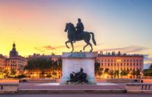 Equestrian statue of Louis XlV in Lyon, France at Sunset